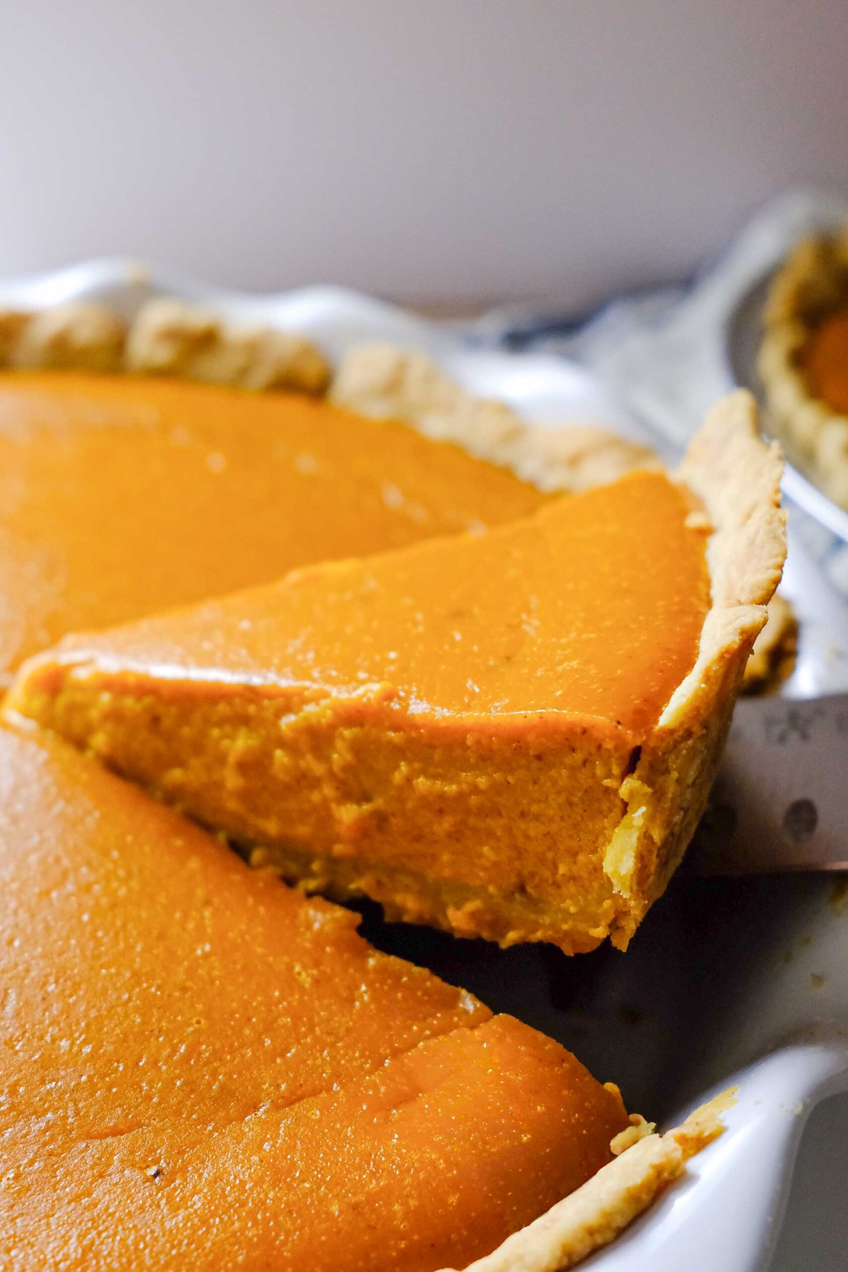 pumpkin pie recipe with evaporated milk being sliced