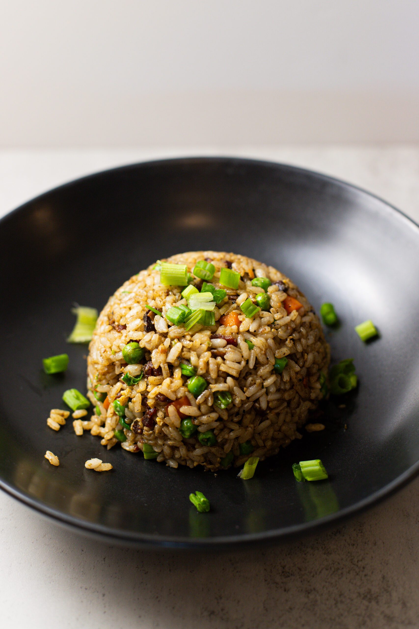 fried rice in a black bowl