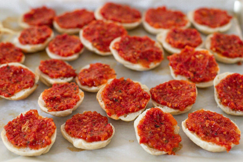 mini bagels covered with pizza sauce