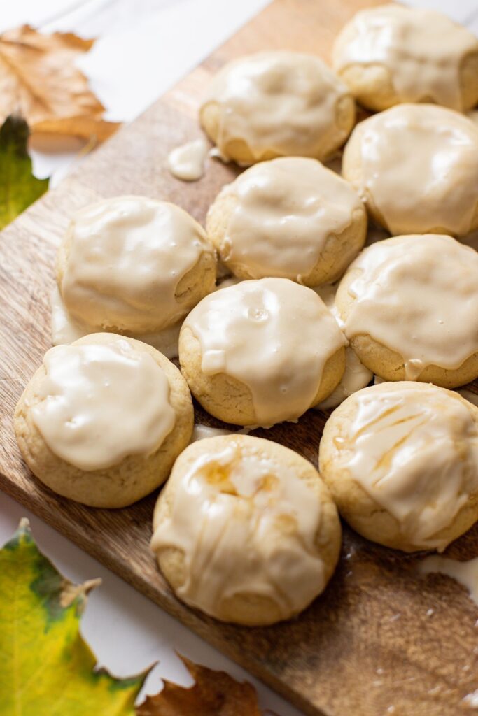 maple cookies sitting on cutting board