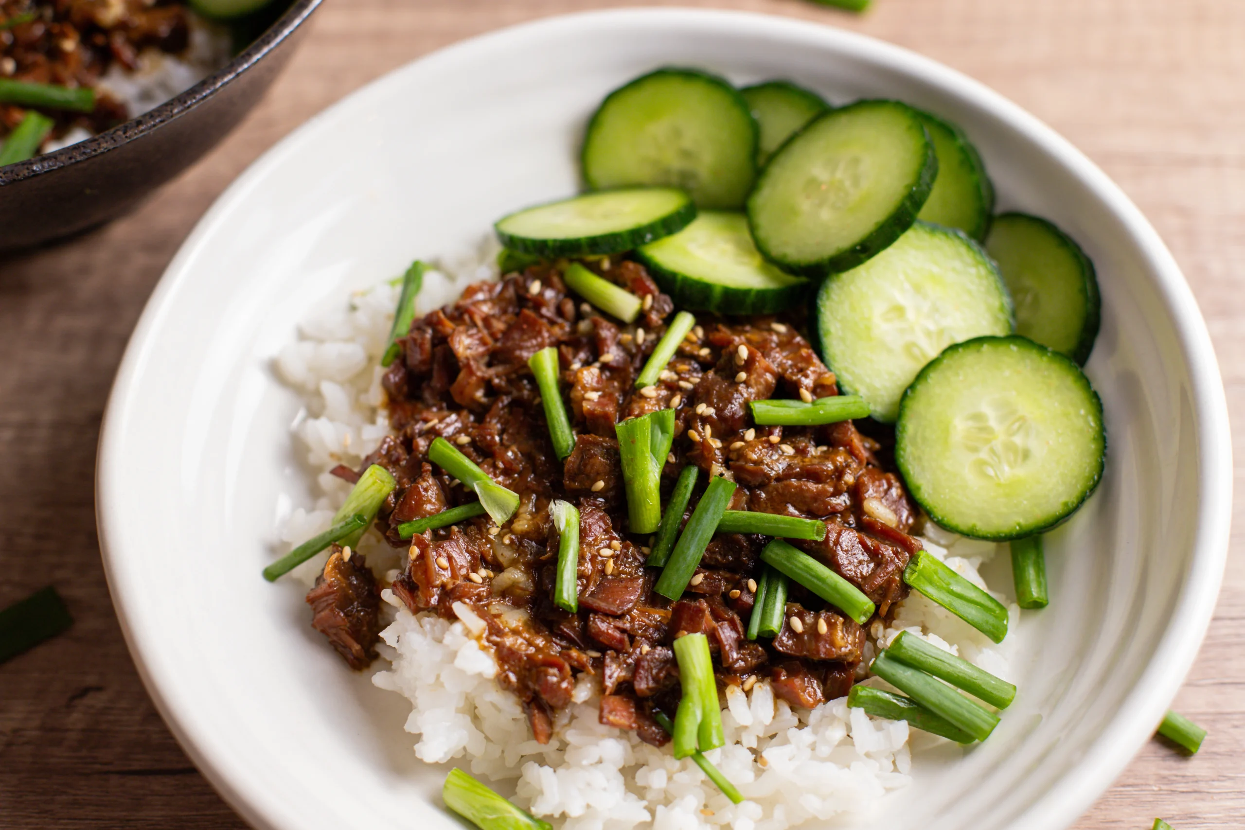 slow cooker korean beef recipe in white bowl