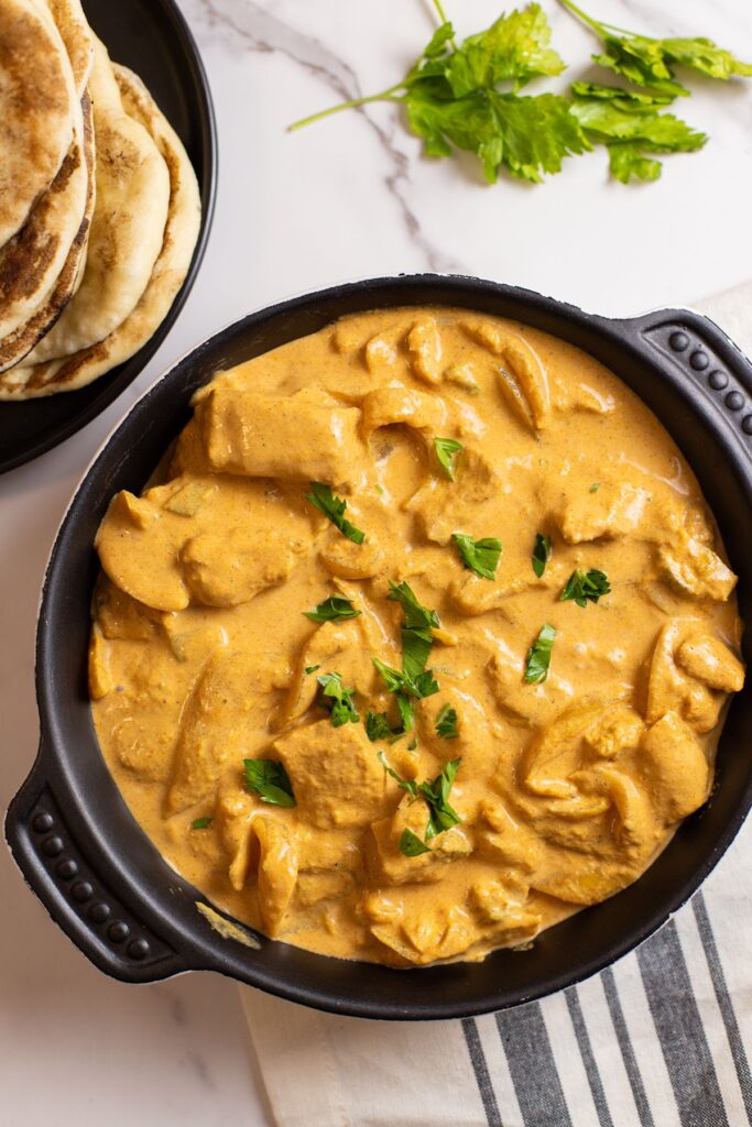 best slow cooker tikka masala recipe easy on marble table