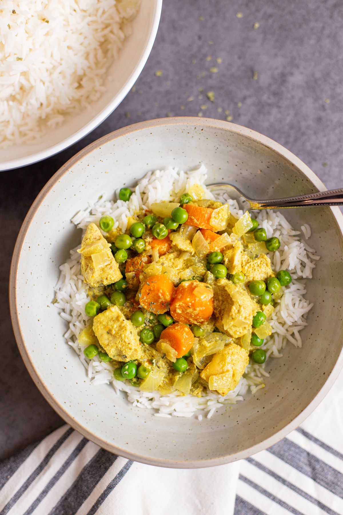 easy slow cooker chicken curry in bowl with rice