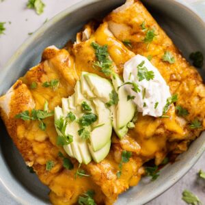 slow cooker chicken enchiladas with sour cream and avocado