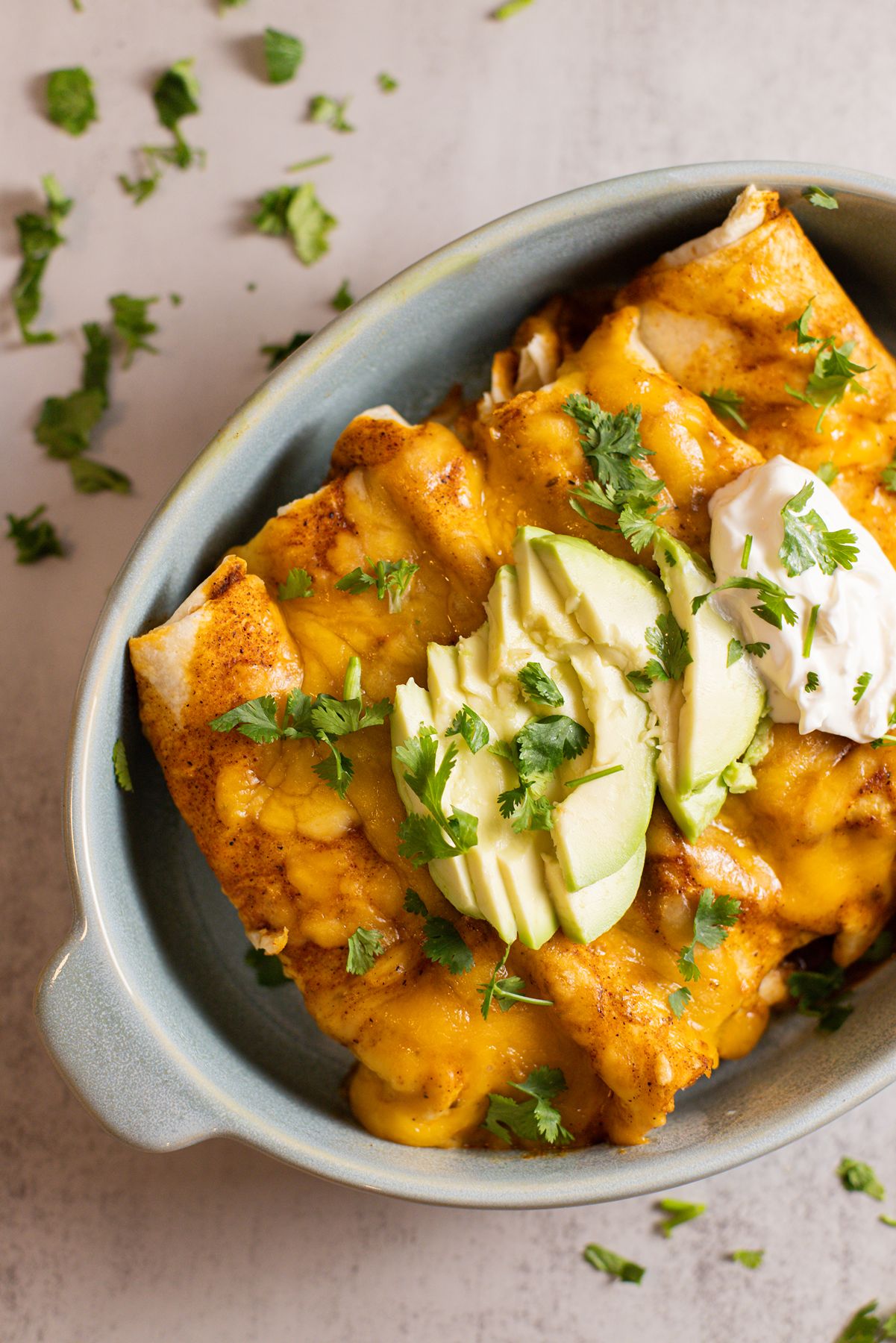 slow cooker chicken enchiladas in dish