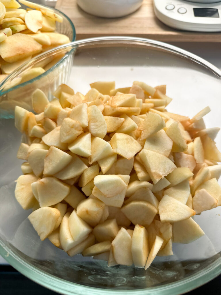 chopped ingredients for mini apple pies in muffin tins