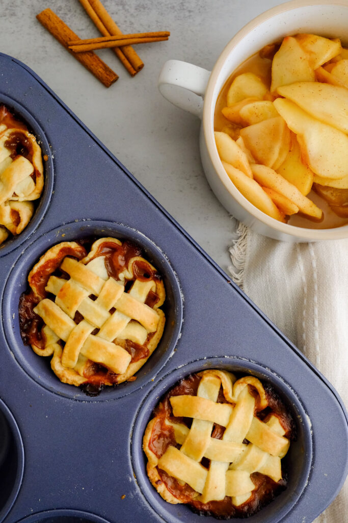 Baking tray filled with a mini apple pie recipe