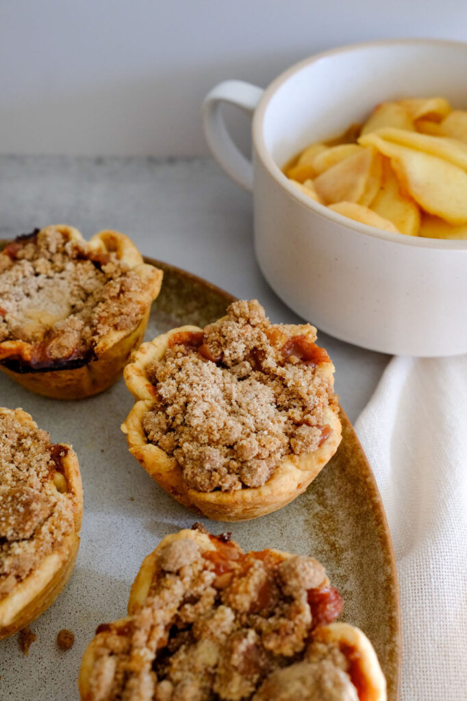 mini dutch apple pies on plate