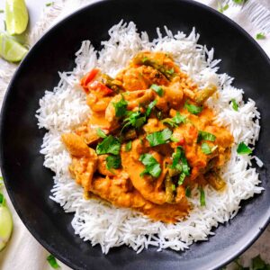 red chicken curry slow cooker in a bowl