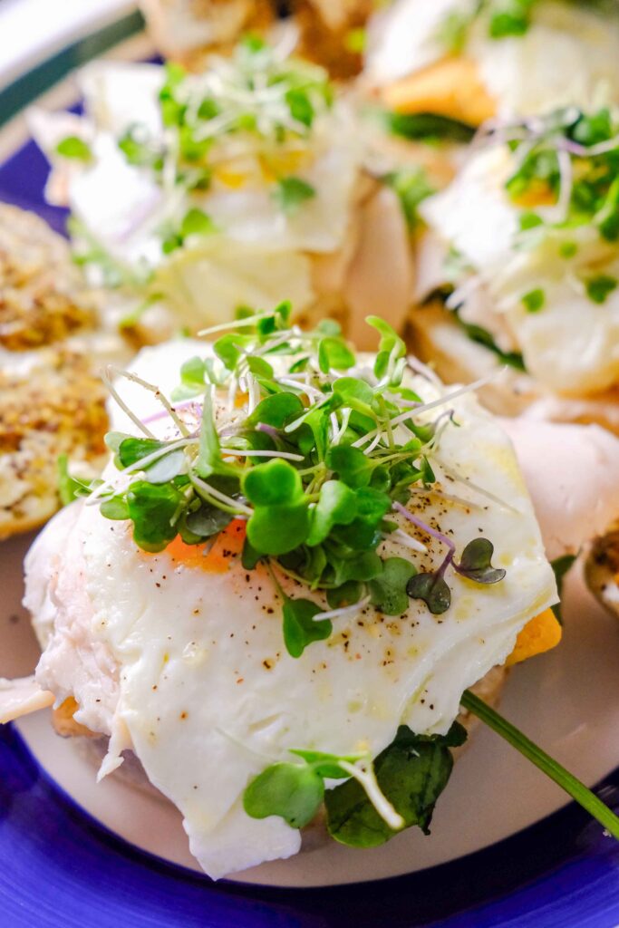 bagel breakfast sandwich recipe​ on a plate