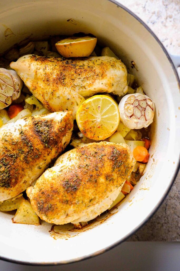chicken breast dutch oven​ recipe with vegetables and lemon