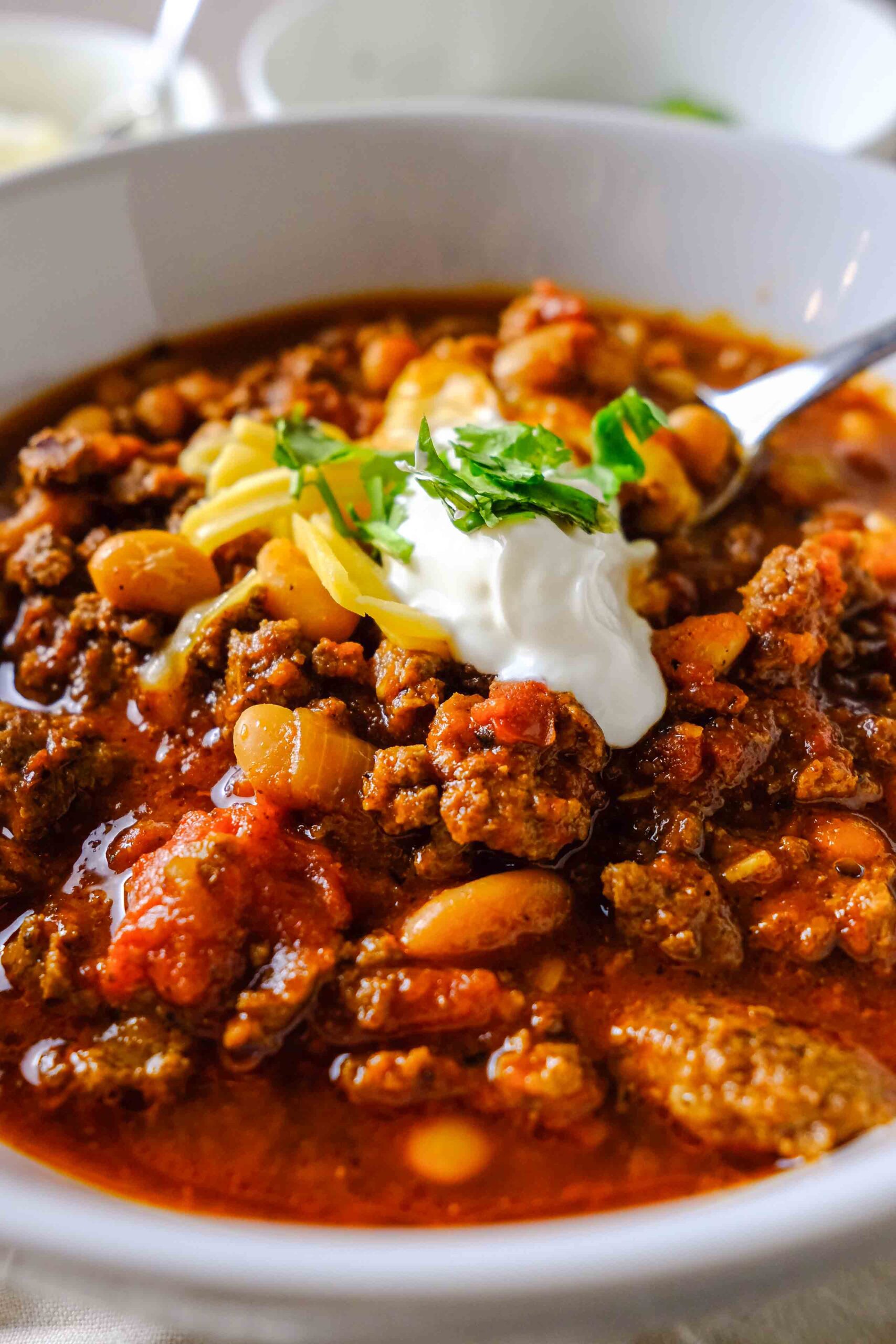 toppings on easy slow cooker chili recipe​