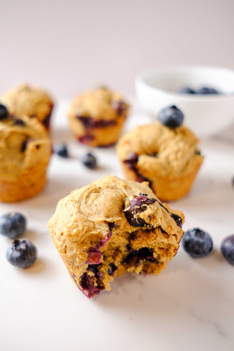 high protein cottage cheese blueberry muffins​ bitten