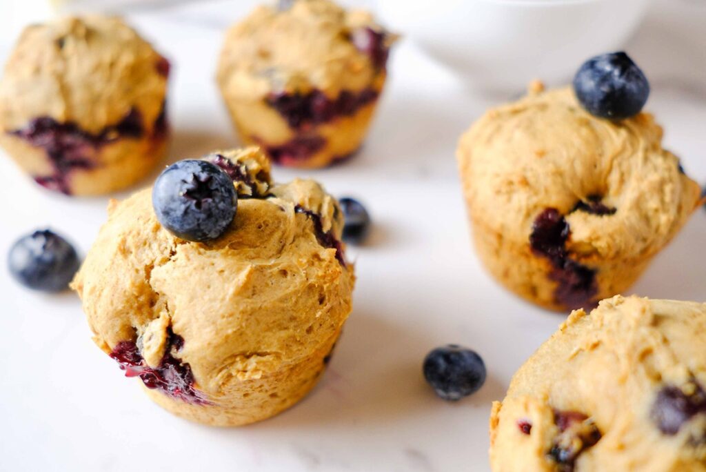 blueberry cottage cheese muffins on a table