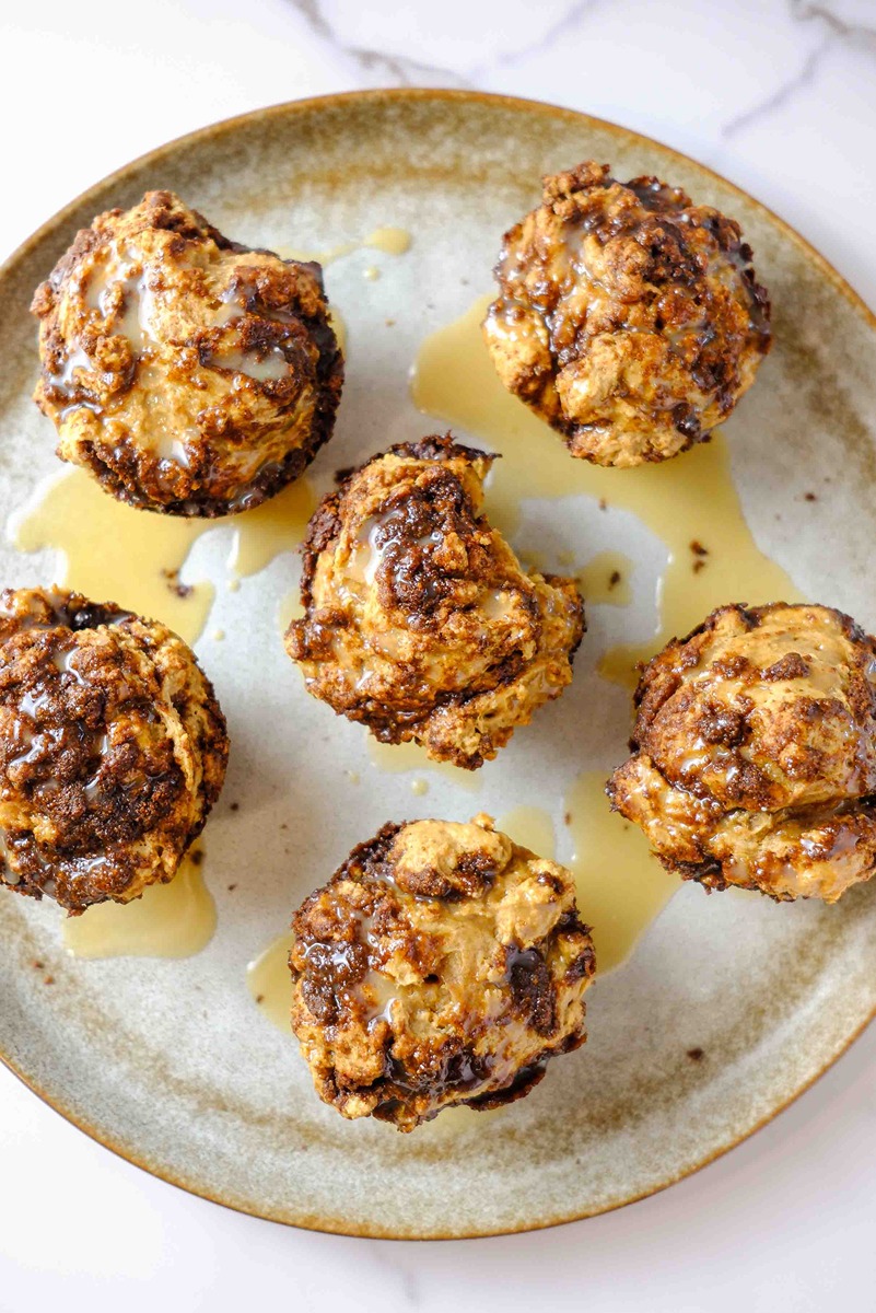 high protein cottage cheese cinnamon roll muffins​ with maple glaze