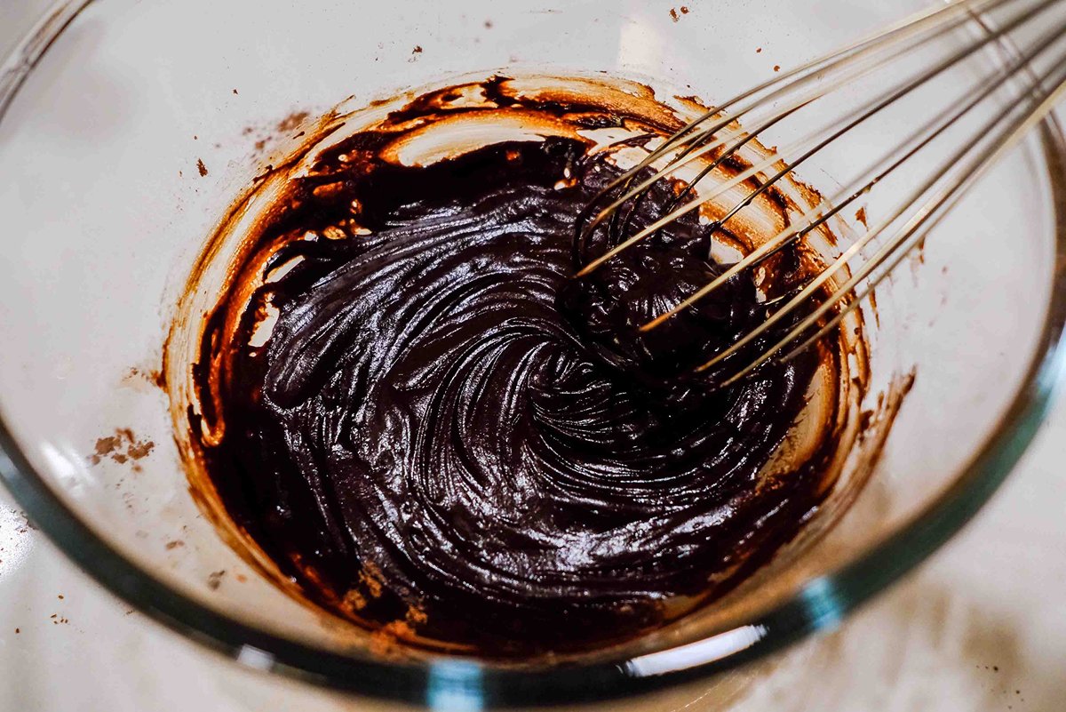 whisk in bowl to show how to make a chocolate with cocoa powder​
