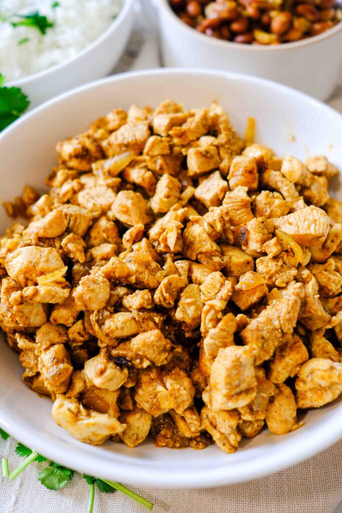 the best copycat chipotle chicken recipe, cooked and in a bowl