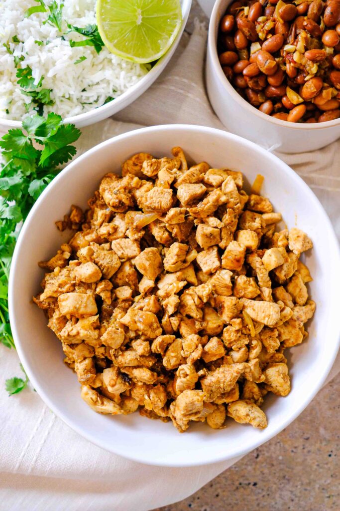 the best chipotle chicken copycat recipe​, cooked and in a bowl